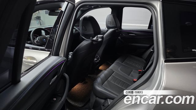 BMW iX3 2024 — photo 17