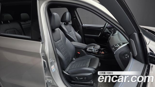BMW iX3 2024 — photo 16