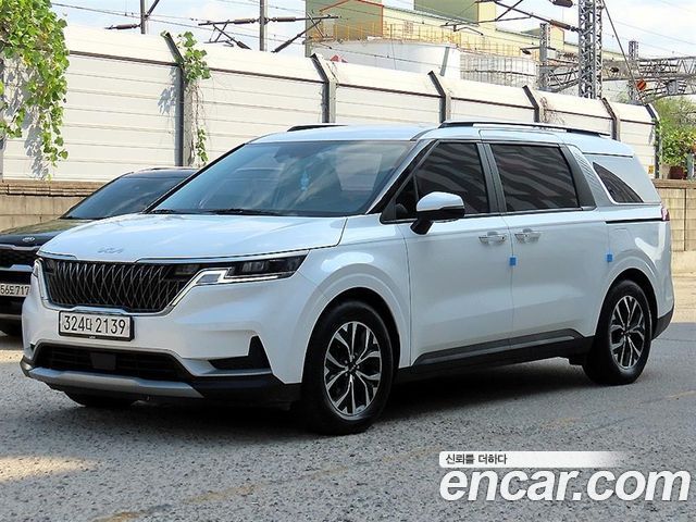 Kia Canival 2023 — photo 2