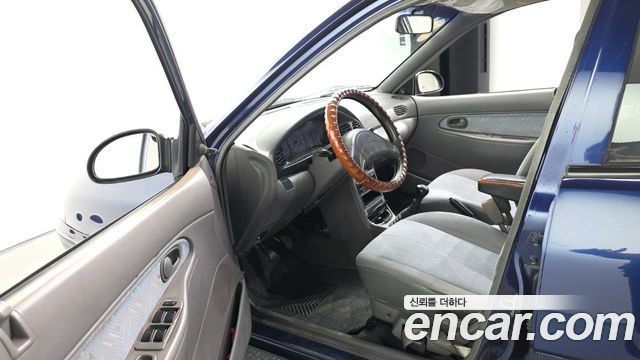 Kia Avella 1996 — photo 13