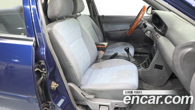 Kia Avella 1996 — photo 17