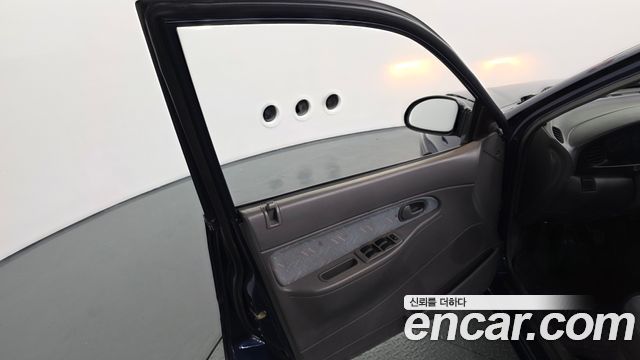 Kia Avella 1996 — photo 14
