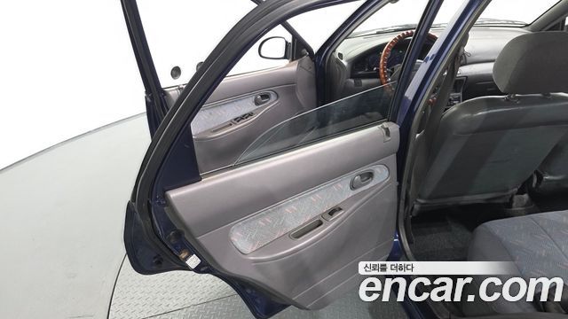Kia Avella 1996 — photo 15