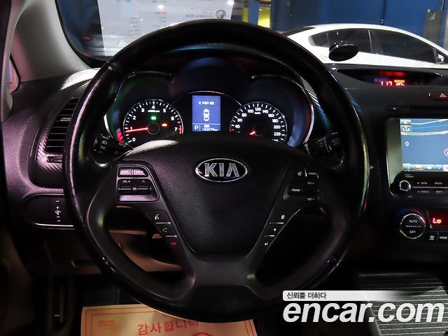 Kia K3 2014 — photo 10