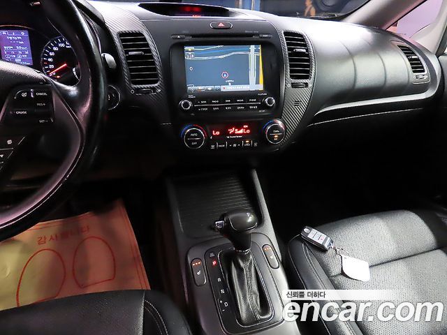 Kia K3 2014 — photo 11