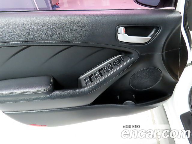 Kia K3 2014 — photo 14
