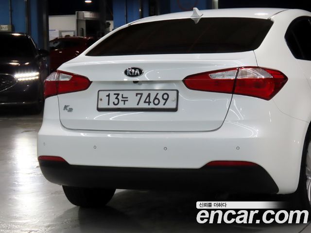 Kia K3 2014 — photo 17