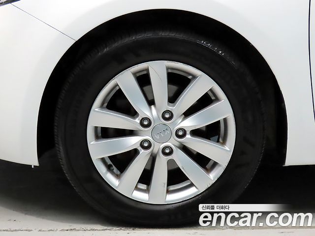 Kia K3 2014 — photo 20