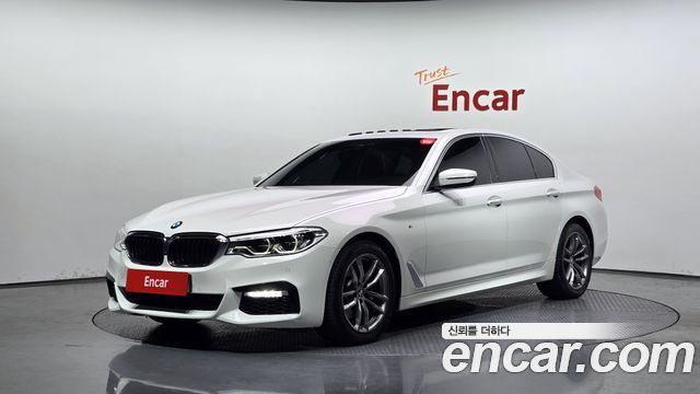 BMW 5-Series 2018 — photo 1