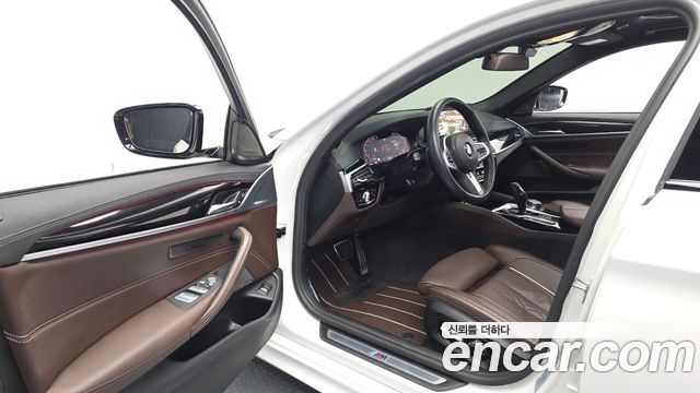 BMW 5-Series 2023 — photo 13
