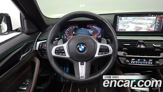 BMW 5-Series 2023 — photo 19