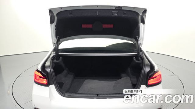 BMW 5-Series 2023 — photo 26