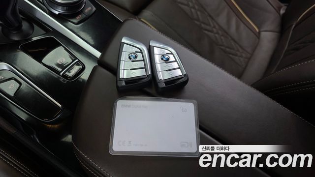 BMW 5-Series 2023 — photo 28