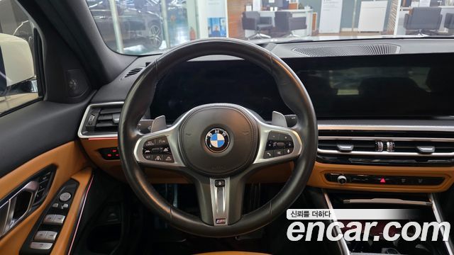 BMW 3-Series 2023 — photo 11