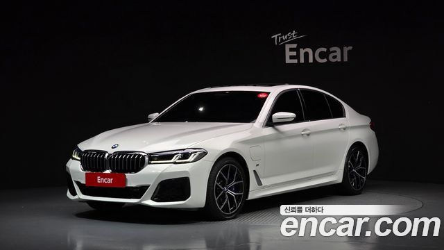 BMW 5-Series 2021 — photo 1