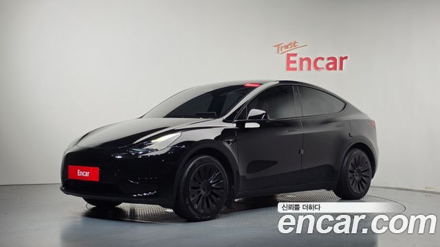 Tesla Model Y 2024 — photo 37