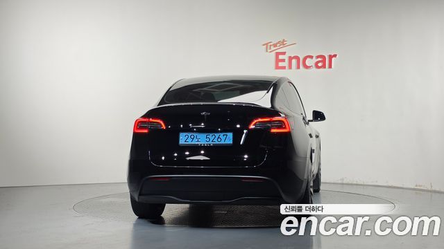 Tesla Model Y 2024 — photo 4