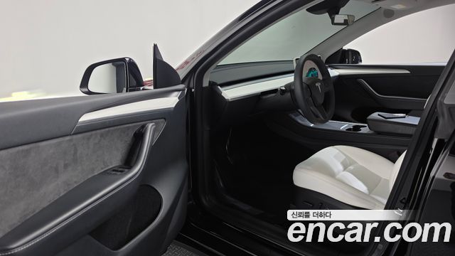 Tesla Model Y 2024 — photo 13