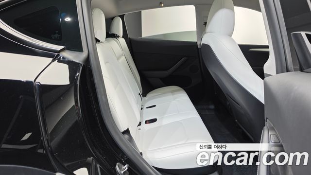 Tesla Model Y 2024 — photo 17