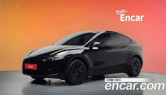 Tesla Model Y 2024 — photo 1