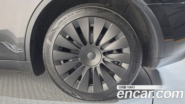 Tesla Model Y 2024 — photo 7