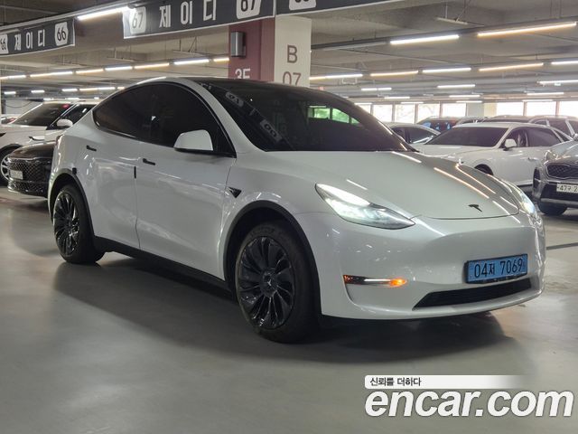 Tesla Model Y 2022 — photo 1