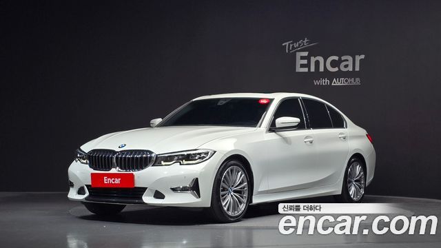 BMW 3-Series 2022 — photo 1