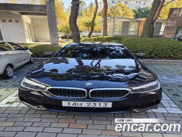 BMW 5-Series 2019 — photo 1