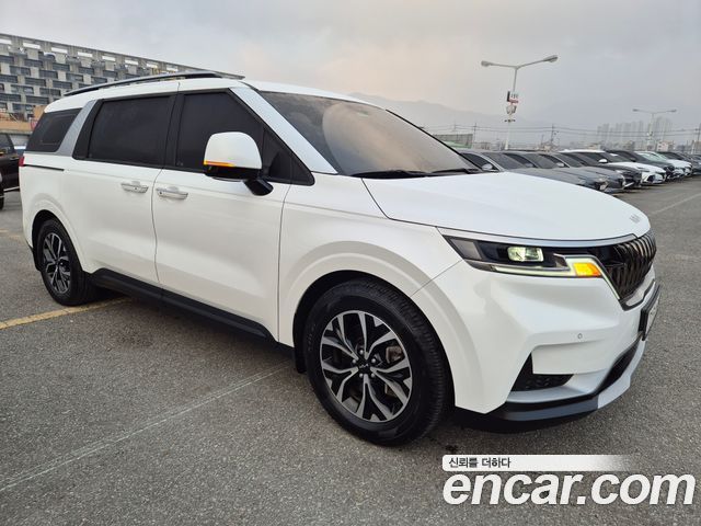 Kia Canival 2023 — photo 2
