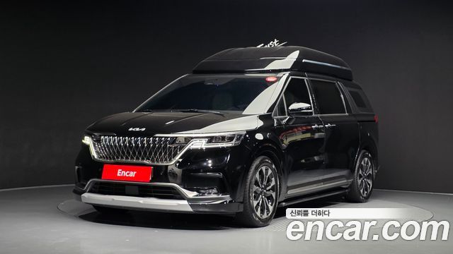Kia Canival 2023 — photo 1