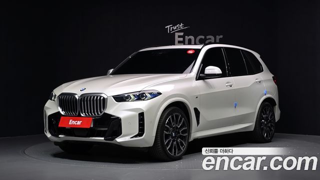 BMW X5 2024 — photo 1