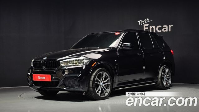 BMW X5 2015 — photo 1