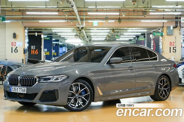 BMW 5-Series 2021 — photo 1