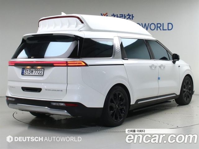 Kia Canival 2021 — photo 2
