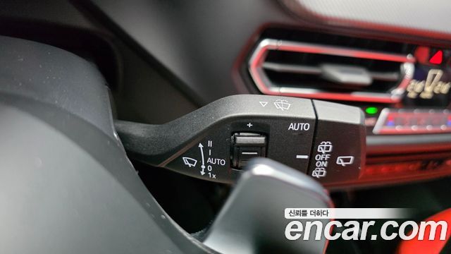 BMW 1-Series 2023 — photo 28