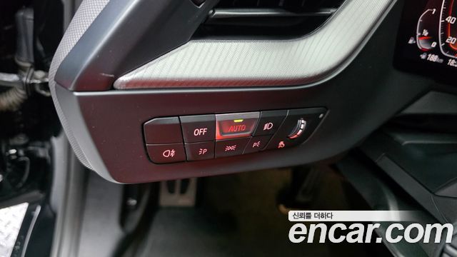 BMW 1-Series 2023 — photo 30
