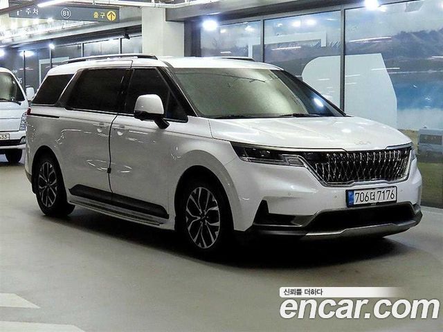 Kia Canival 2023 — photo 1
