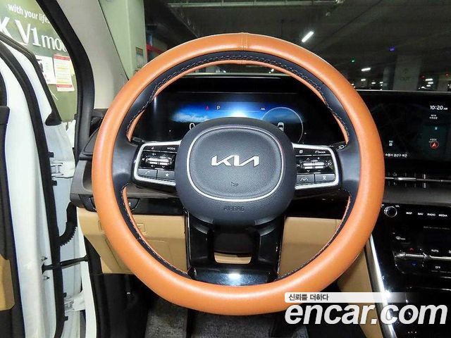 Kia Canival 2023 — photo 8