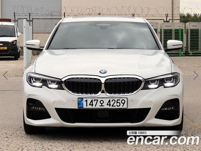 BMW 3-Series 2021 — photo 1