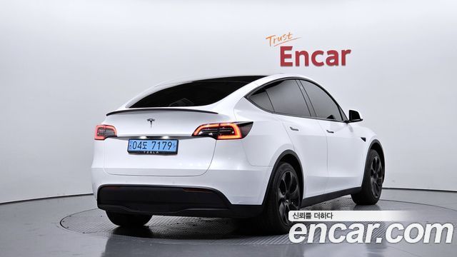 Tesla Model Y 2021 — photo 2
