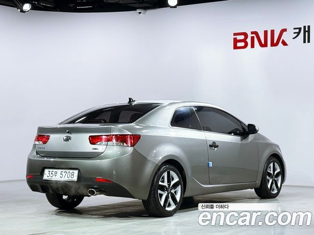 Kia Porte 2010 — photo 2