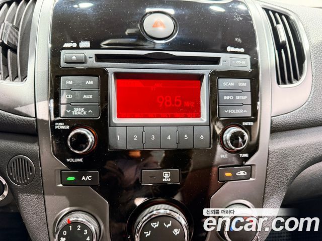 Kia Porte 2010 — photo 11