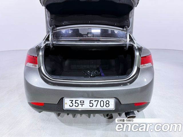 Kia Porte 2010 — photo 19