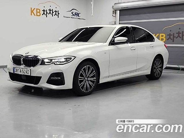 BMW 3-Series 2021 — photo 1