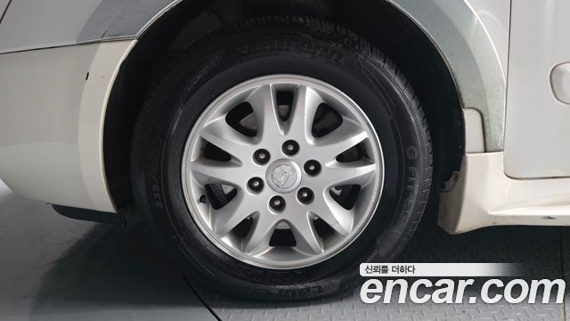 Kia Canival 2010 — photo 5