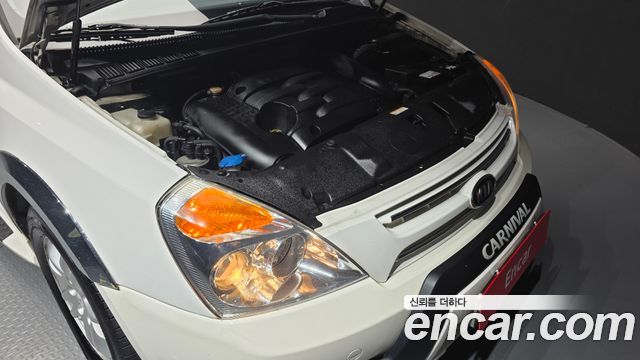 Kia Canival 2010 — photo 6