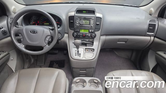 Kia Canival 2010 — photo 7