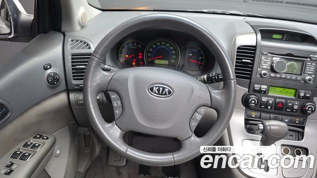 Kia Canival 2010 — photo 13