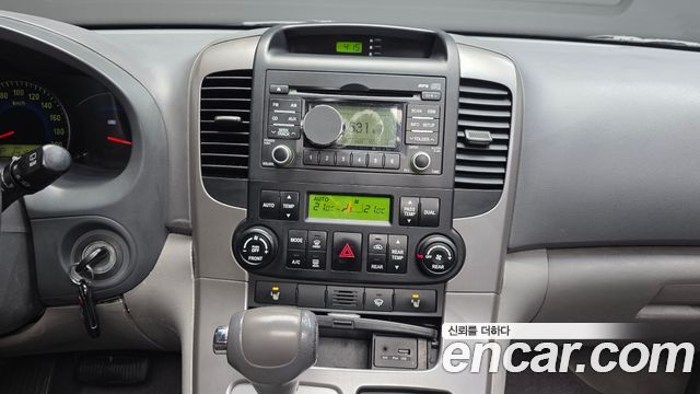 Kia Canival 2010 — photo 14