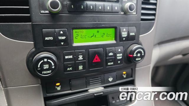 Kia Canival 2010 — photo 16